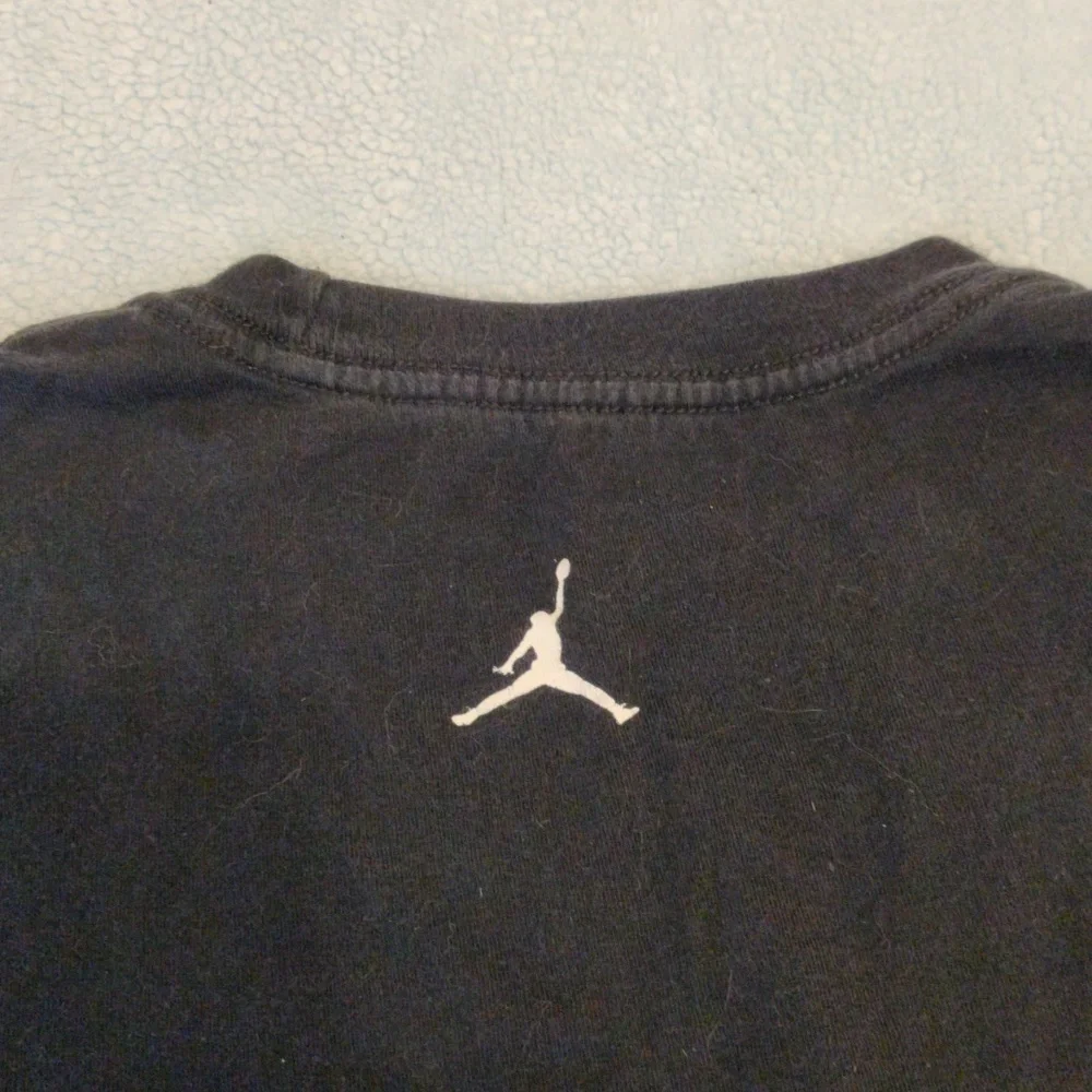 Jordan shirt with Chicago displayed in the middle